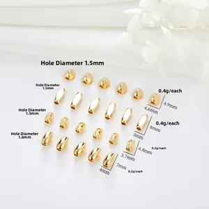 Detailed view of 18K gold plated copper beads in heart and oval shapes for DIY jewelry