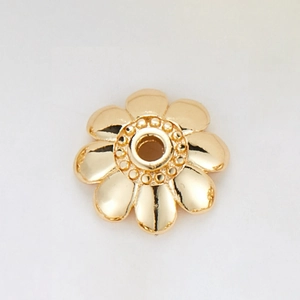 Top view of 14k gold-plated 8-petal flower spacer bead with center hole and dot relief