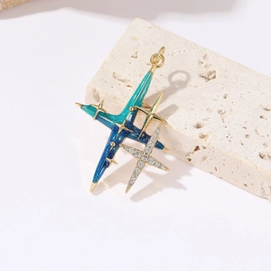 Star-themed pendant with blue-green gradient enamel and white zircon in gold plating
