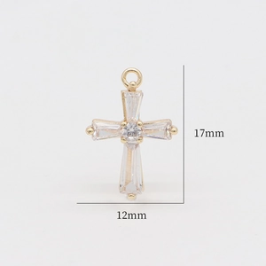 Macro detail of cross pendant with inlaid zircons and precise 17x12mm measurements