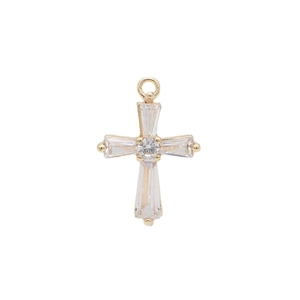 Exquisite 14k gold plated cross pendant with baguette-cut zircons on white background