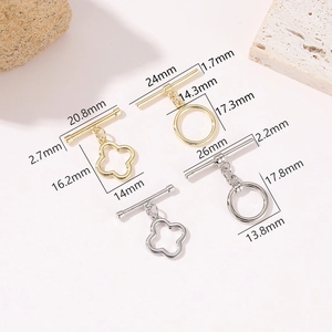 Detailansicht goldener und silberner Kleeblatt OT-Verschlüsse für DIY-Schmuck