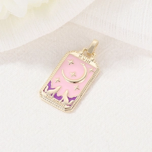 Detail of tarot card The Moon pendant with 14K gold plating and colorful enamel drip