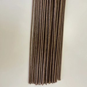Detailed view of brown paper-wrapped floral stems for DIY artificial flower bouquets