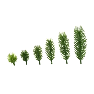 Detail of 6 artificial green pine needles branches for DIY Christmas wreath and decor