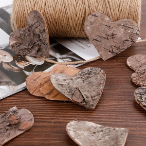 Natural birch bark heart-shaped cutouts for DIY rustic wedding or holiday decor