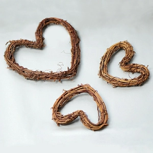 Set of three heart-shaped natural rattan wreaths in different sizes for wedding DIY decor