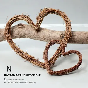 Natural heart-shaped rattan wreath for rustic wedding decor, available in 5 sizes