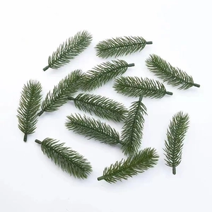 Artificial green pine needles stems for DIY Christmas wreaths and holiday decorations