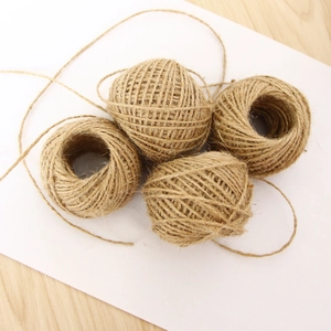 Set of four natural jute twine balls for eco-friendly gift wrapping and DIY crafts