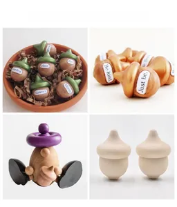 Detail view of handcrafted DIY wooden acorns with painted finishes and rustic wood texture