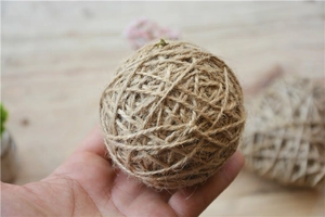 Natural jute hemp rope balls for Christmas window displays and rustic tree decorations