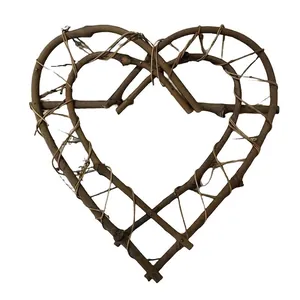 Natural brown heart-shaped rattan frame handmade for air plants and home wall decoration