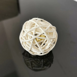 White woven rattan ball cat toy with golden metal bell inside for pet amusement