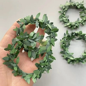 Three-piece set of artificial green leaf rings for gift wrapping and home decoration