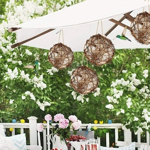 Hanging woven rattan bird nest balls for parrot chewing and garden decoration