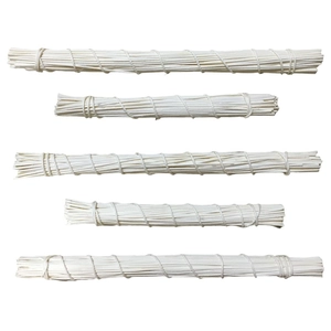 White fiber diffuser sticks in five lengths for aromatherapy fragrance oil bottles