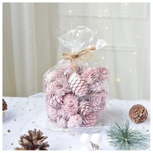 Pommes de pin décoratives roses en emballage cadeau pour sapin de Noël et art floral