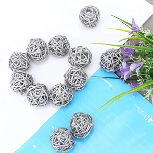 Silver rattan woven balls for Christmas and wedding decoration on a white background