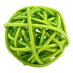 Macro detail of hand-woven bright green rattan ball with natural fiber texture