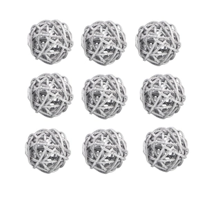 Detail of nine silver wicker rattan balls in a neat 3x3 matrix for holiday decor