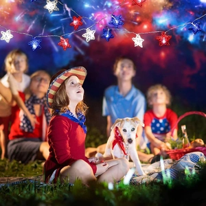Close-up of red, white, and blue woven star decorations for Independence Day festive setting