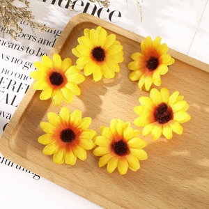 Set of 6 realistic yellow silk sunflower heads for DIY crafts on a rustic wooden tray