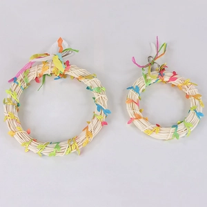 Colorful vine parrot swing toys with natural fiber rings and bright paper leaves