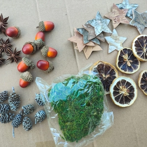 Natural dried cinnamon, star anise, orange slices and acorns for Christmas DIY craft decor