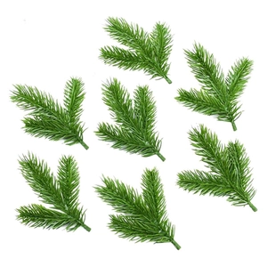 Detailed view of seven artificial pine branches for Christmas wreaths and DIY decorations
