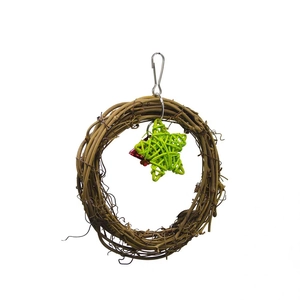Detail of bird swing toy with brown rattan wreath, green star, and red metal bell