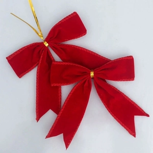 Nœuds de Noël en velours rouge avec attaches dorées pour couronnes et décorations de fête