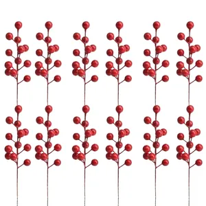 Set of 12 artificial red holly berry stems with glossy finish for festive holiday decoration