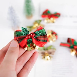 Red and green plaid Christmas bow with golden bells for DIY wreath decoration