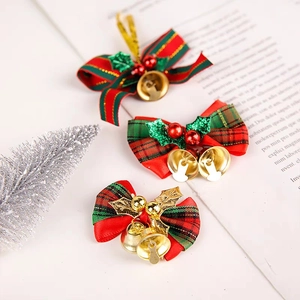 Christmas plaid bows with golden bells and red berries for tree and wreath decoration