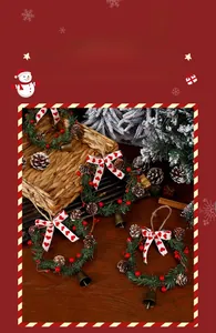Detailed Christmas wreath with pine needles, cones, red berries and rustic metal bell