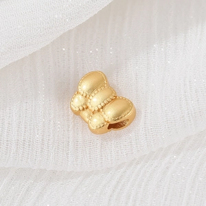 Golden money bag bead charm with quilted pattern for DIY bracelet and necklace making