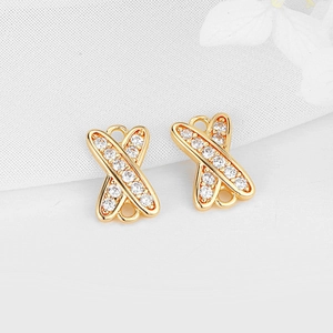 Golden crisscross pendant connectors with pavé cubic zirconia and dual link rings