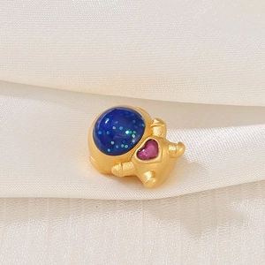 Matte gold astronaut charm with blue starry globe and pink heart for DIY bracelets