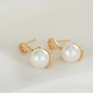 Elegant gold eight-pointed star pearl earrings with S925 silver needles and zircon accents