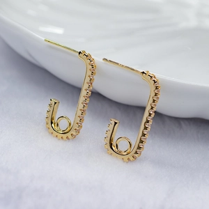 Elegant gold paperclip earrings with micro-pave zircon crystals for a luxury look