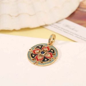 Ethnic round enamel coin pendant with Tibetan patterns in gold and turquoise colors