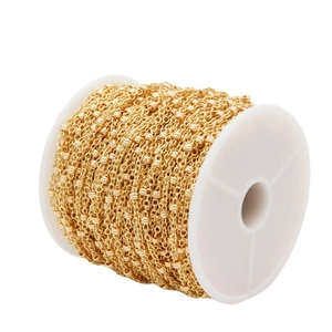 14K gold-plated DIY jewelry accessory chain on a white plastic spool for necklaces