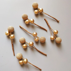 Set of 7 gold Christmas berry stems with frosted glitter and shiny mirror finish beads