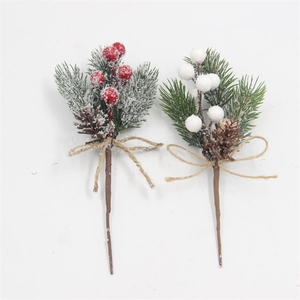 Detail of Christmas picks with berries, pine cones and rustic twine bow accents