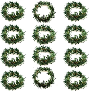 Set of 12 artificial green PVC pine needle napkin rings for festive Christmas table decor