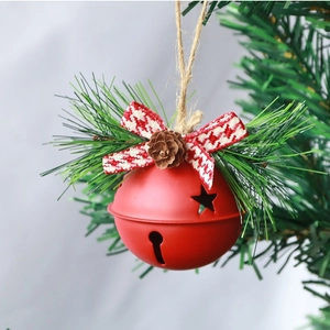 Christmas iron bells with star cutouts, pine cones, and a red checkered bow decor