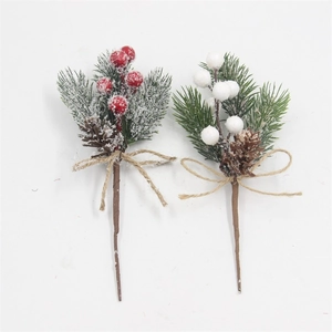 Artificial Christmas berry bouquet with pine cones, needles, and jute bow on branches