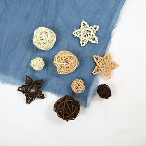 Handwoven rattan ball and star hanging decor set in white, beige, and dark brown tones