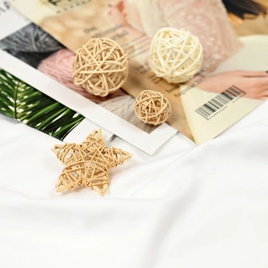 Handwoven rattan stars and balls decorative set in natural tones for home and photo props